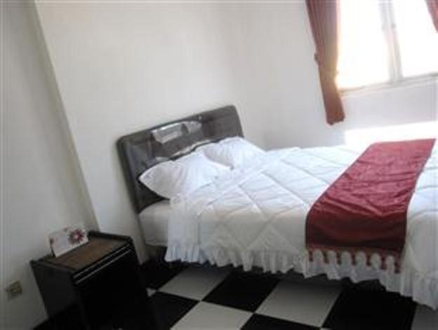 Providence Homestay Surabaya Habitación foto